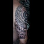Polynesian sleeve tattoo black work