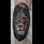 Realistic Lion face tattoo portrait