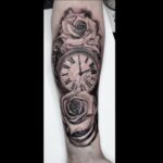 Realistic pocket watch and roses tattoo
