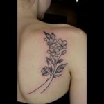 Line work flower tattoo